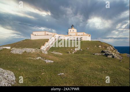 The image is of Strathy Point lighthouse in the far north of the Scottish Highlands overlooking the North Atlantic Stock Photo