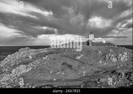 The image is of Strathy Point lighthouse in the far north of the Scottish Highlands overlooking the North Atlantic Stock Photo