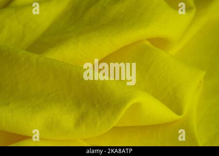 Wrinkled linen cloth folded napkins. Natural linen fabric texture. Textured fabric background. Concept of using natural eco-friendly materials Stock Photo