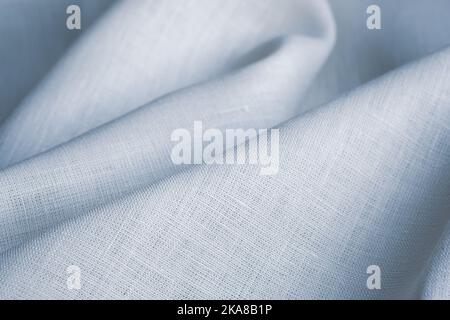 Wrinkled linen cloth folded napkins. Natural linen fabric texture. Textured fabric background. Concept of using natural eco-friendly materials Stock Photo