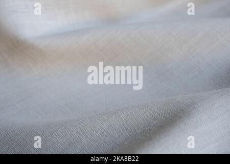Wrinkled linen cloth folded napkins. Natural linen fabric texture. Textured fabric background. Concept of using natural eco-friendly materials Stock Photo