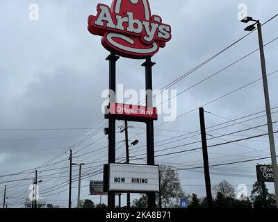 Augusta, GA USA - 12 19 21: Arbys Now Hiring street Sign Stock Photo