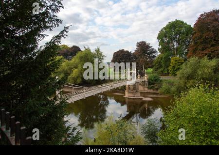 Queen Victoria Bridge, a cast iron suspension bridge crossing the river Wye at Hereford, England Stock Photo