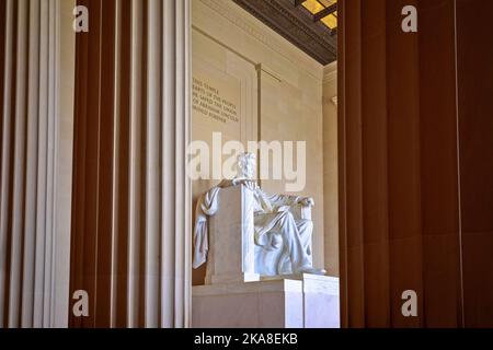 Washington DC, USA, March 24 2022: The Lincoln Memorial columns and 16th president Abraham Lincoln statue in Washington DC. It is on the western end o Stock Photo