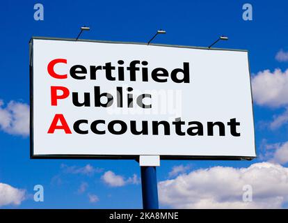 CPA certified public accountant symbol. Concept words CPA certified public accountant on billboard on a beautiful blu sky background. Business and CPA Stock Photo