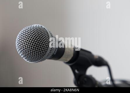 Sure SM58 Microphone on a stand in a recording studio ready for recording Stock Photo