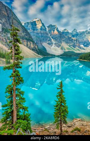 The idyllic Moraine Lake near Lake Louise, Alberta, Canada at sunrise. Stock Photo