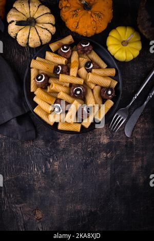 Halloween pasta with meatballs in shape of eye Stock Photo