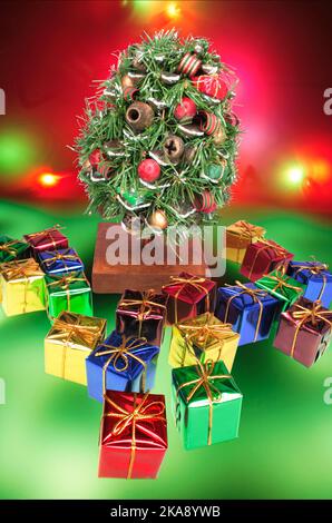 Miniature Christmas Tree and Gift Boxes Stock Photo