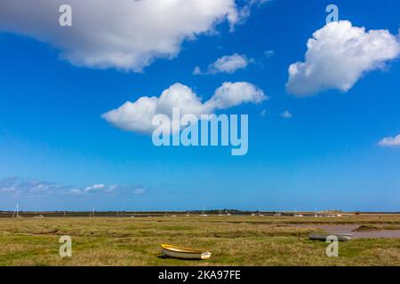 View across the flat salt marshes at Brancaster on the north Norfolk coast in eastern England UK. Stock Photo