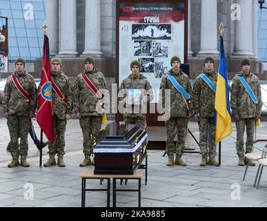 KYIV, UKRAINE - OCTOBER 29, 2022 - Servicemen stand to attention behind ...