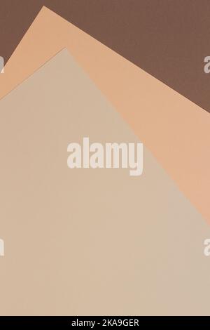 Color papers geometry composition banner background with beige, yellow, light brown and dark brown tones. Stock Photo