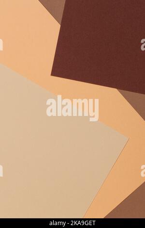 Color papers geometry composition banner background with beige, yellow, light brown and dark brown tones. Stock Photo