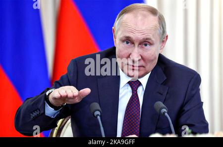 Sochi, Russia. 31st Oct, 2022. Russian President Vladimir Putin gestures as he responds to a question during a short press briefing following trilateral discussions with Azerbaijani President Ilham Aliyev and Armenian Prime Minister Nikol Pashinyan at the presidential residence at Cape Idokopas, October 31, 2022 in Sochi, Krasnodar Krai, Russia. Credit: Sergej Bobylev/Kremlin Pool/Alamy Live News Stock Photo