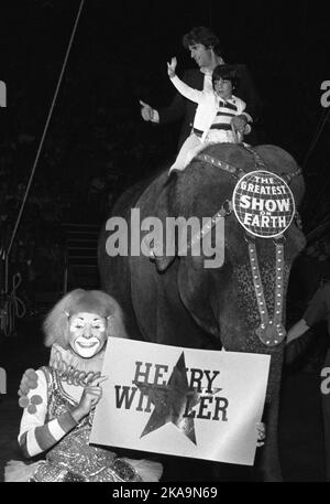 Henry Winkler and stepson Jed Weitzman at Ringling Bros. and Barnum & Bailey Circus 1979.  Credit: Ralph Dominguez/MediaPunch Stock Photo