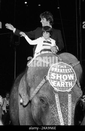 Henry Winkler and stepson Jed Weitzman at Ringling Bros. and Barnum & Bailey Circus 1979.  Credit: Ralph Dominguez/MediaPunch Stock Photo