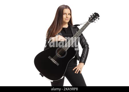 Female musician with an acoustic guitar posing isolated on white background Stock Photo