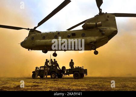 Petrochori Training Area, Greece. 11th Oct, 2022. Soldiers assigned to 1st Battalion, 502nd Infantry Regiment, 2nd Brigade Combat Team, 101st Airborne Division (Air Assault), conduct sling load operations with a CH-47 Chinook assigned to the 2-501st General Support Aviation Battalion, Combat Aviation Brigade, 1st Armored Division, on October. 10, 2022, at Petrochori Training Area, Greece. The USA commitment to defending NATO territory is ironclad and the USA will continue to bolster our posture to better defend our NATO Allies. (Credit Image: © U.S. Army/ZUMA Press Wire Service/ZUMAPRESS.c Stock Photo