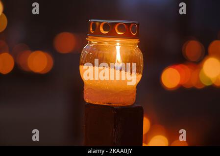 Warsaw, Poland. 01st Nov, 2022. Lanterns with candles are seen lit at the Brodno cemetery in Warsaw, Poland on 01 November, 2022. (Photo by Jaap Arriens/Sipa USA) Credit: Sipa USA/Alamy Live News Stock Photo