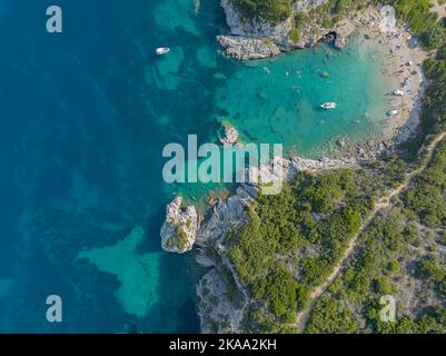 Aerial view of the coastline cliff that lead to Porto Timoni beach, Corfu island, Greece. Thin strip that forms two beaches bathed by crystal water Stock Photo