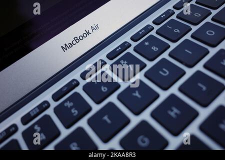 Itterbeck, Germany - Nov 1 2022  Keyboard of a small silver Macbook Air with black keys Stock Photo