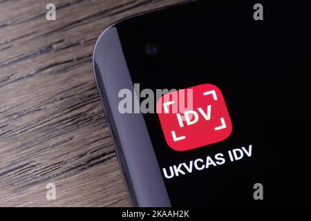 UKVCAS IDV app seen on smartphone. UK Visa and Citizenship Application Services app for Identity Verification and submitting visa documents. Stafford, Stock Photo