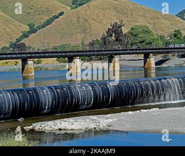 inflatable rubber dam on Alameda Creek, Fremont, California Stock Photo