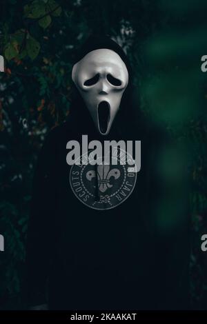 Person with scream mask for Halloween Stock Photo