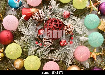 Colorful Christmas garland and decorative decorations for the Christmas tree Stock Photo