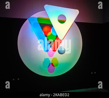 Optical hologram of the primary colors of the spectrum with triangle and sphere Stock Photo