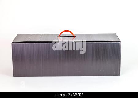 empty grey box with orange handle Stock Photo