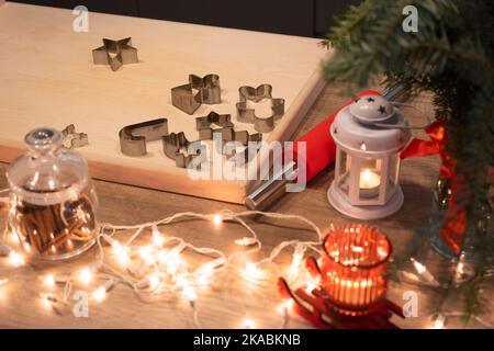 Christmas festively decorated kitchen with christmas lights, and cookie cutters Stock Photo