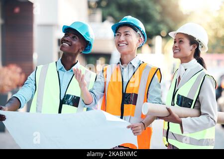 Blueprint, industrial and architects with smile for construction, building design and architecture on site together. Happy, creative and engineering Stock Photo
