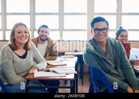 This is the course everyone wants to take. Cropped portrait of a group of university students sitting in class during a lecture. Stock Photo