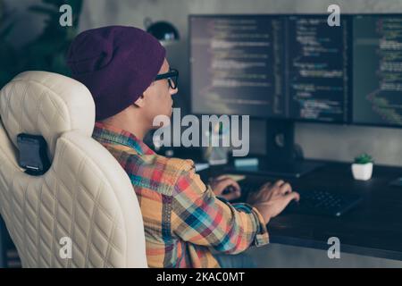 Rear portrait of professional cybersecurity expert keyboard write typing microsoft office indoors Stock Photo