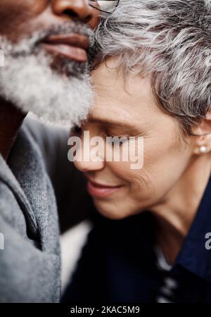 Eternal love. Closeup up shot of an affectionate senior couple relaxing on the sofa at home. Stock Photo