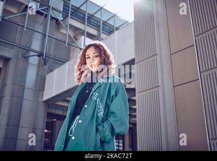 Fashion, urban and portrait of a woman on travel holiday with buildings in the city in Turkey. Young, stylish and outdoor fashion model with designer Stock Photo