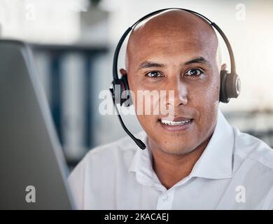 Telemarketing, face and portrait of man working in a call center as operator ready to give advice. Assistance, agent and headset with representative Stock Photo