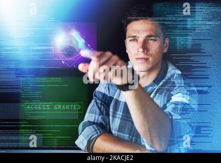 The future is within reach. a handsome young male programmer at work. Stock Photo