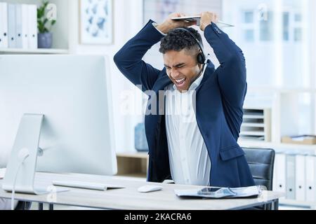 Stress, angry or shouting call center businessman breaking computer keyboard in crm consulting fail, sales deal risk or 404 glitch. Mad, screaming or Stock Photo