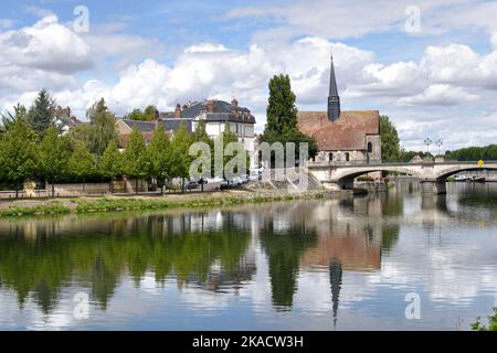 A church reflected in the still waters of the river at Sens in France, on a clear summer day Stock Photo
