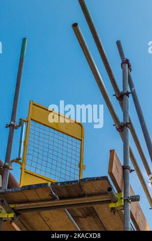 Scaffolding poles on a domestic property Stock Photo - Alamy