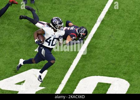 New Orleans, LA, USA. 27th Nov, 2015. Tulane Green Wave running back Dontrell  Hilliard (26) runs the ball during the game between Tulane Green Wave and  Tulsa Golden Hurricane at Yulman Stadium