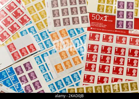 An array of new and unused but old style traditional postage stamps issued by the Royal Mail due for withdrawal from use in January 2023. They all feature a profile portrait of Queen Elizabeth the second, QE2, the late Queen of the UK. (132) Stock Photo