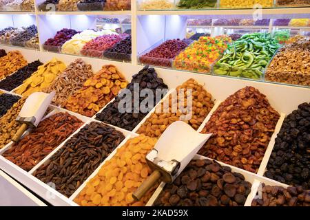 Eastern Bazaar. Nuts, Spices and Sweets. Traditional Azerbaijani Cuisine Ingredients. Dried fruit and herbs at the local market in Baku, Azerbaijan. Stock Photo