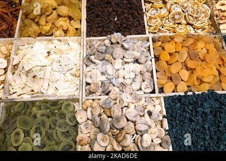 Eastern Bazaar. Nuts, Spices and Sweets. Traditional Azerbaijani Cuisine Ingredients. Dried fruit and herbs at the local market in Baku, Azerbaijan. Stock Photo