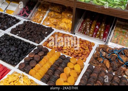 Eastern Bazaar. Nuts, Spices and Sweets. Traditional Azerbaijani Cuisine Ingredients. Dried fruit and herbs at the local market in Baku, Azerbaijan. Stock Photo