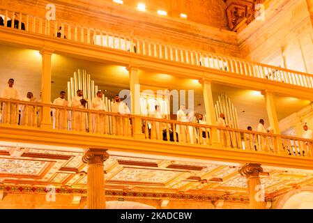 Catholics and priests praying inside the basilica Cathedral at Largo do Pelourinho in Salvador, Brazil. Stock Photo