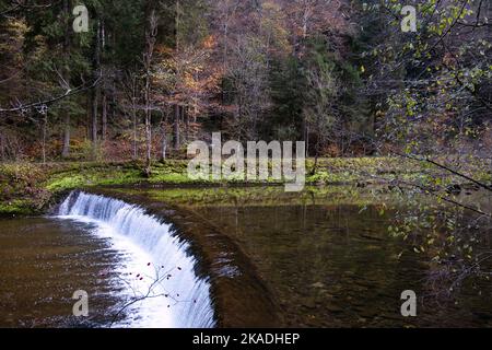 Gorges de l'Areuse, Noirague, Neuchatel, Switzerland, Europe. Beautiful romantic autumn landscape in Jura mountains. River with cascade, mossy stones, Stock Photo