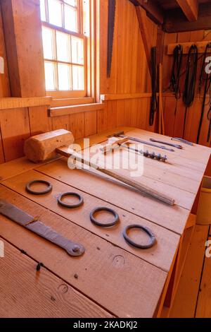 Antique tools in the barn of the pioneer Cove Creek Ranch Fort, built in 1867, Cove Fort, Utah. Stock Photo